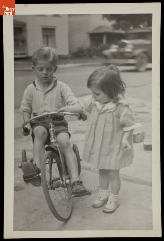 Girl with a Boy on a Tricycle, circa 1940