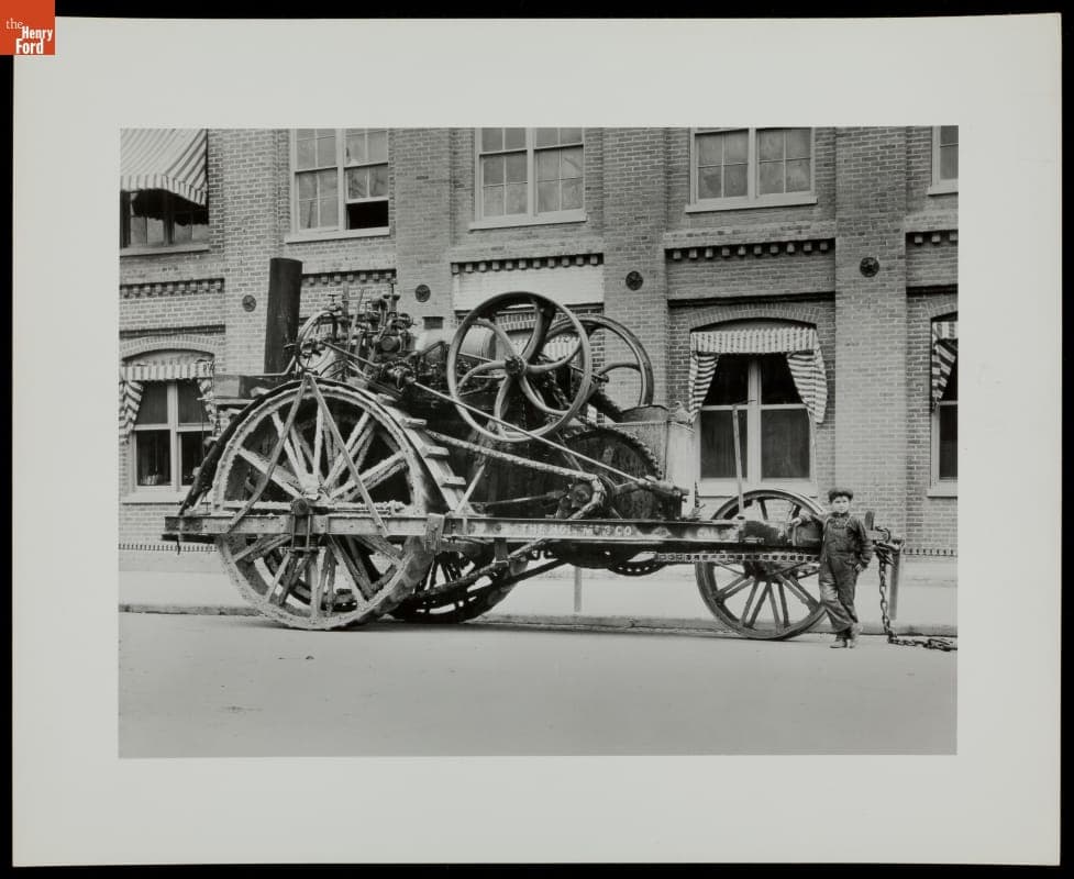 Young Boy Standing in Front of Holt Steam Traction Engine, circa 1890