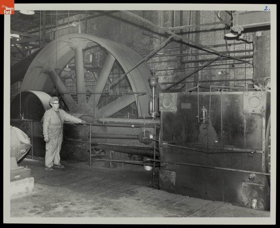 Machine Operator Standing with Steam Engine in Engine Room, Ohio circa 1950