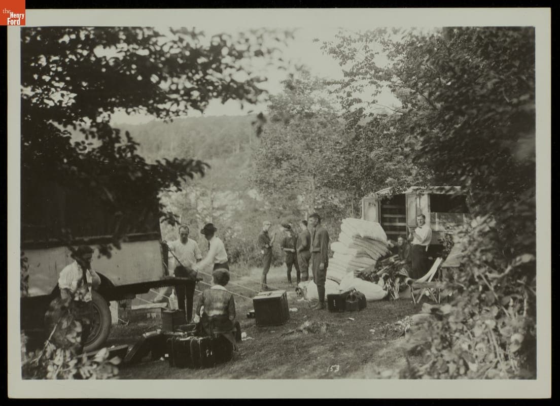 The "Vagabonds" Camping Trip Service Crew Unloading Trucks, Michigan, 1923