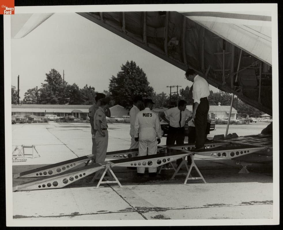 Inspecting C-130 Hercules Transport Plane Loading Ramps, Andrews Air Force Base, 1964