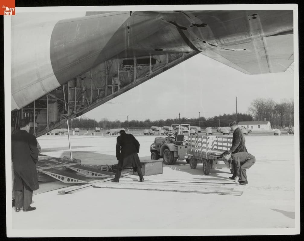 Modifying Ramp on C-130 Hercules Transport Plane to Load Presidential Vehicle, Andrews Air Force Base, circa 1960