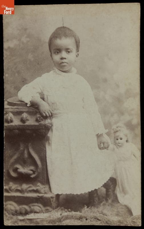 Young Girl Holding a Doll, circa 1890