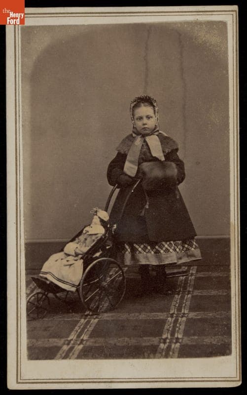 Young Girl with Doll and Doll Buggy, circa 1865