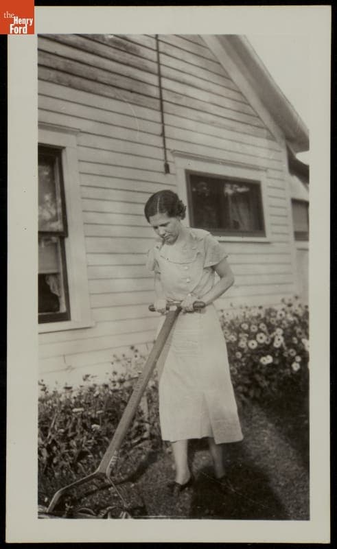 Anita Searl Mowing the Lawn, Olean, New York, circa 1934