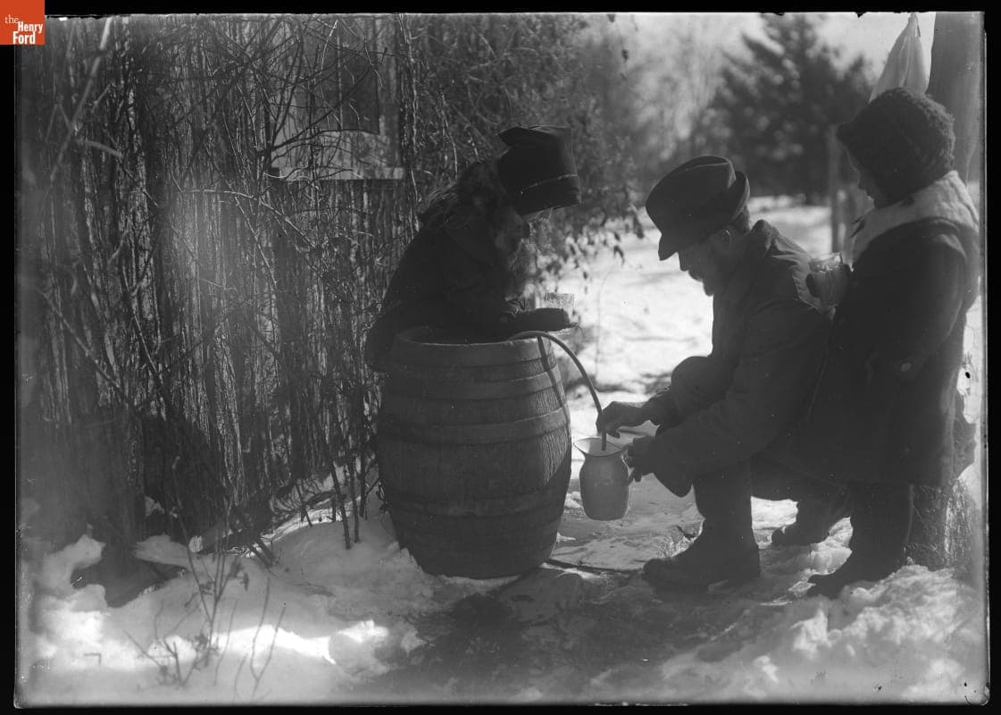 Julian Burroughs Pouring Cider with Daughters Ursula and Elizabeth, circa 1909