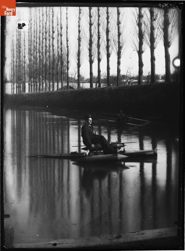 Leon Bollee Steering the Boat "Eugene," circa 1900