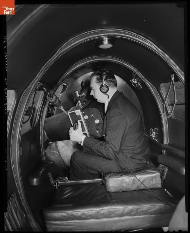 Detroit News--Airplane--Lockheed Orion--Early Bird--Interior View--William A. Kuenzel and Camera--Item1