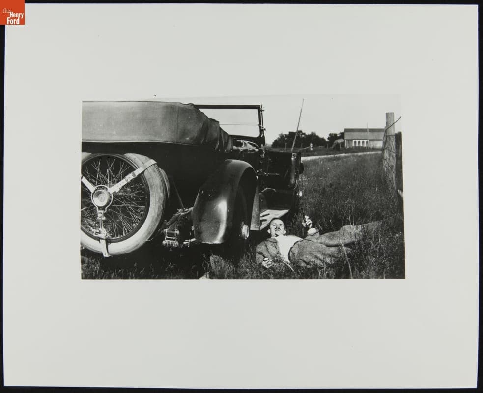 Ernest Kanzler Repairing Automobile during Edsel Ford's 1915 Cross-Country Road Trip