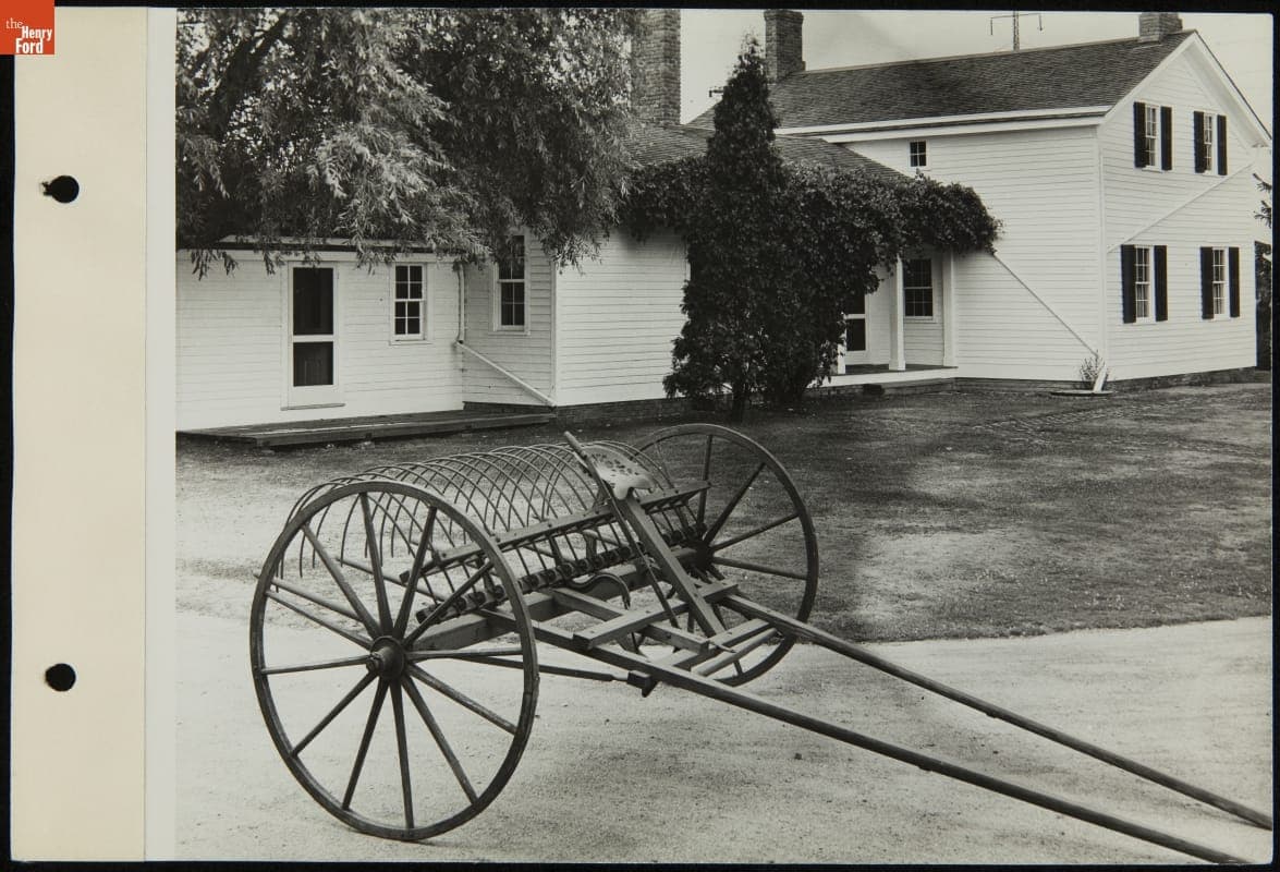 Hay Rake outside Ford Home (Henry Ford's Birthplace) at Its Original Site, Dearborn, Michigan, 1931