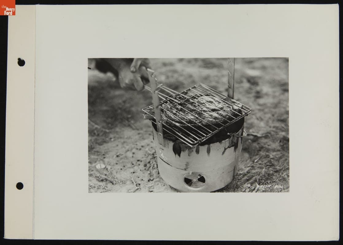 Grilling Meat using Ford Charcoal Briquets, 1934