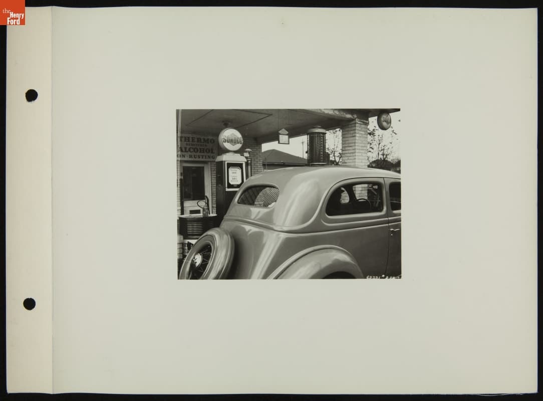 Car at Gas Station Fuel Pump, February 1935