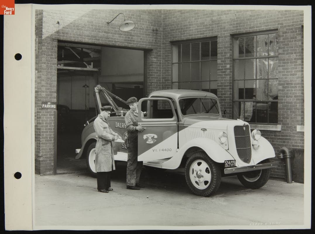 Tow Truck at Service Station Garage Entrance, April 1935
