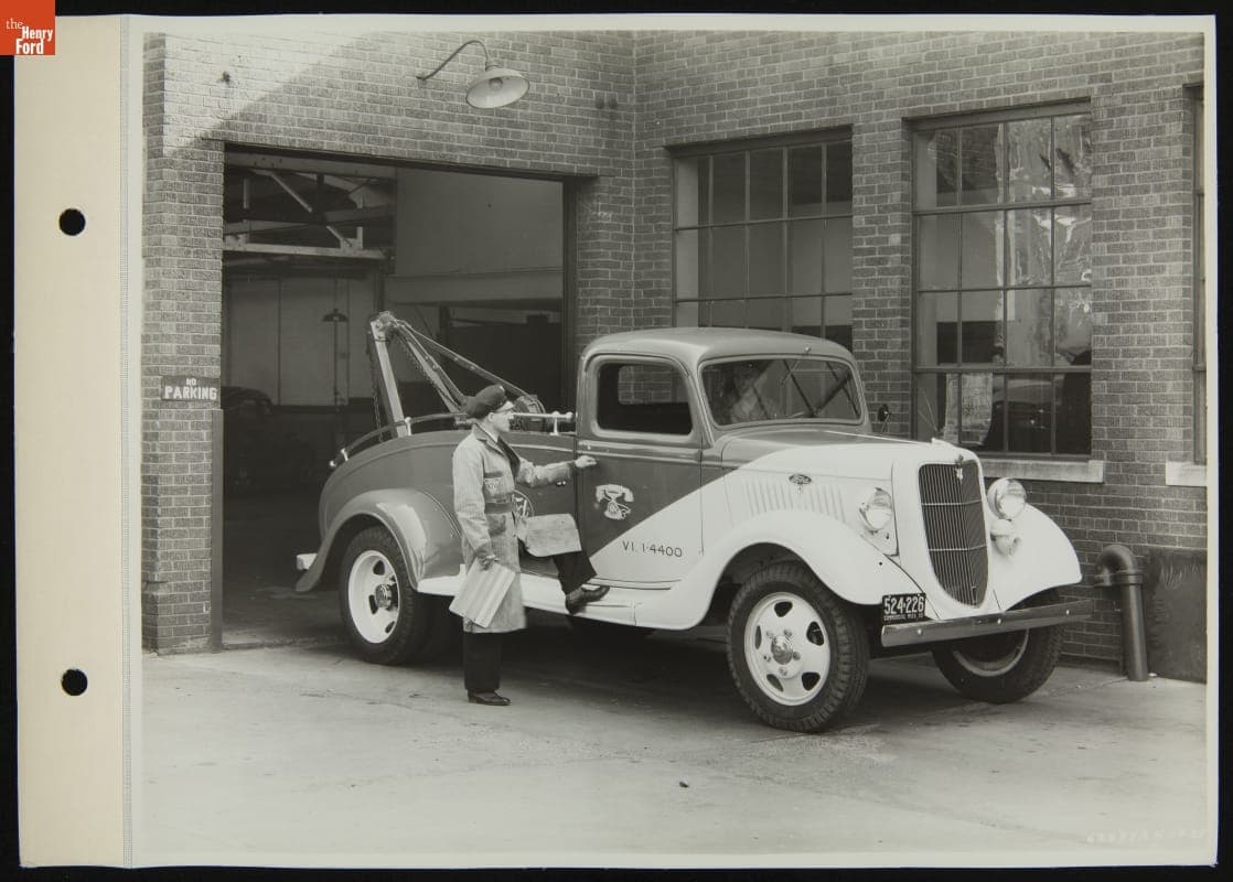 Tow Truck at Service Station Garage Entrance, April 1935