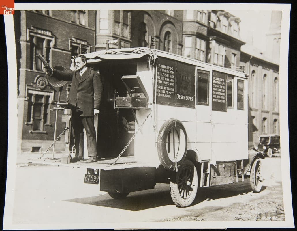 Fred L. Strickland Preaching from His Traveling Mission Truck, 1924