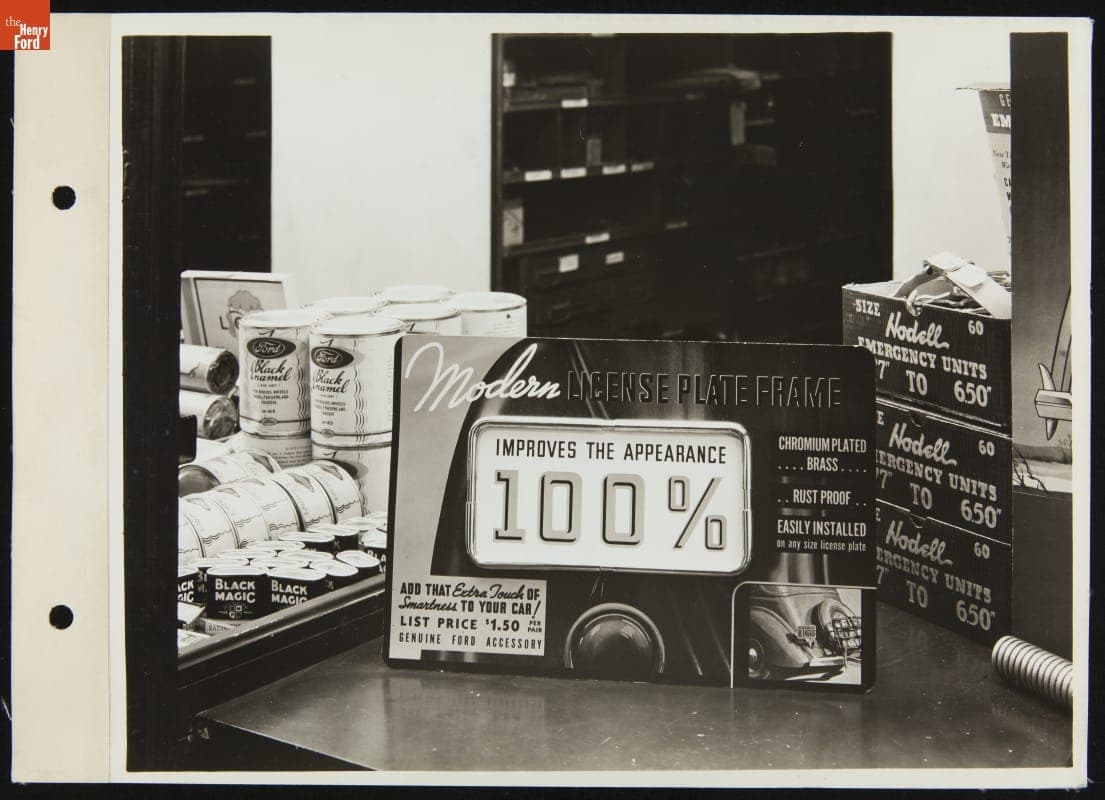 Display Card Advertisement for Ford License Plate Frame, February 1936