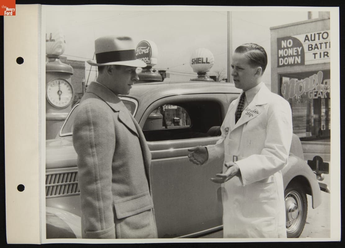 Service Manager Speaking with Man at Ford Super Service Station, April 1936