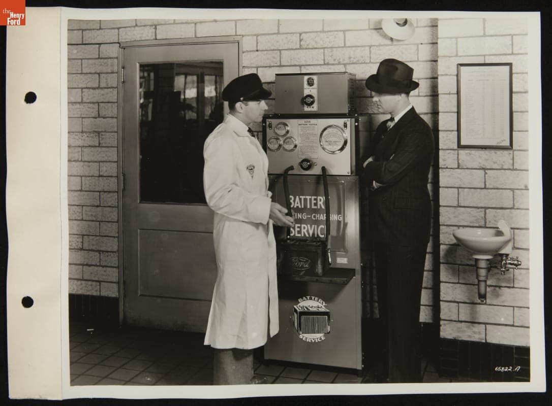Service Attendant and Customer at K.R. Wilson Battery Tester, April 1946