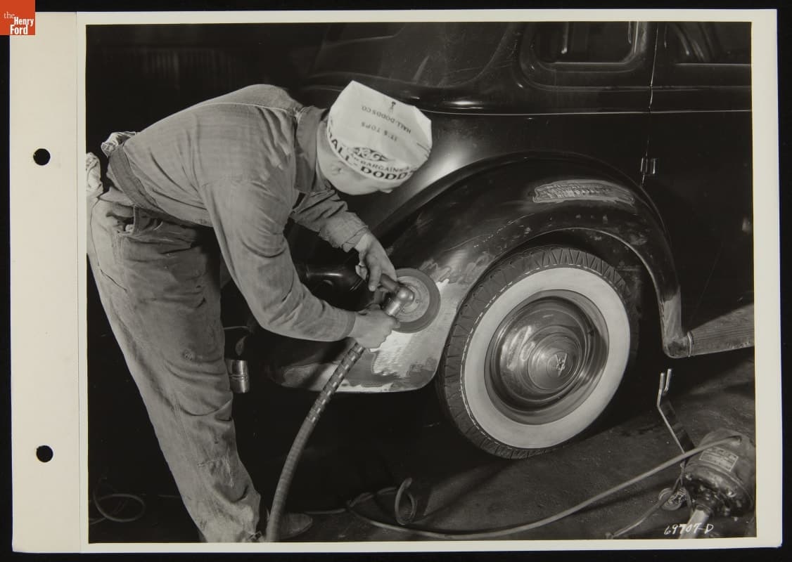 Mechanic Buffing Used Car Fender at Hall-Dodds Dealership, January 1938