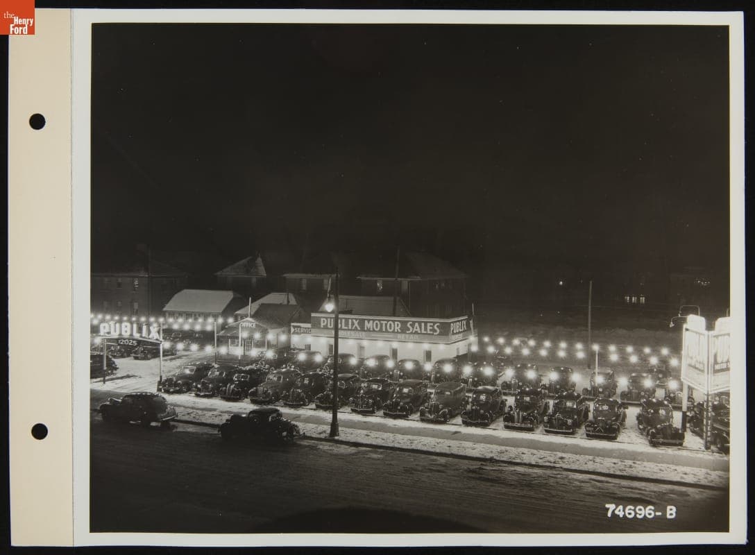 Night View of Publix Motor Sales, Used Car Lot, December 1940