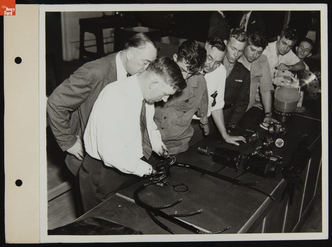 World War I Veterans Demonstrate Use of Their Artificial Limbs to World War II Veterans at Camp Legion, July 1944