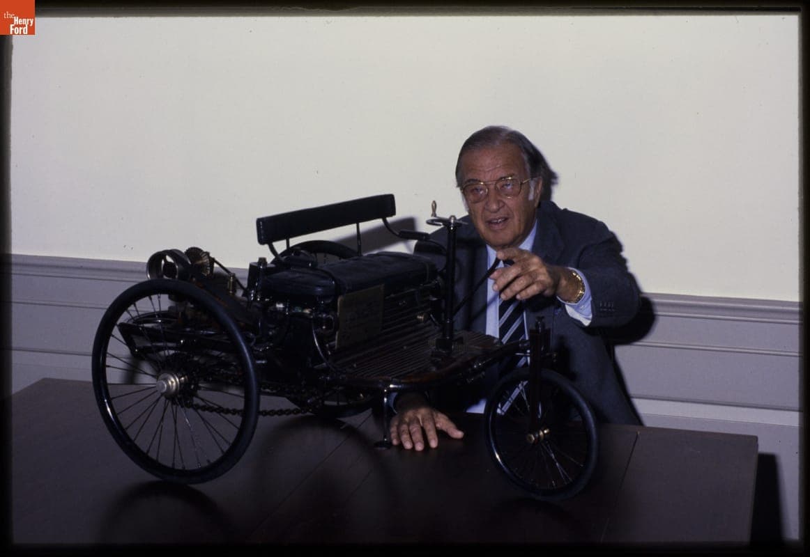 Henry Ford II with the 1885 Benz Scale Replica at Henry Ford Museum, April 1985