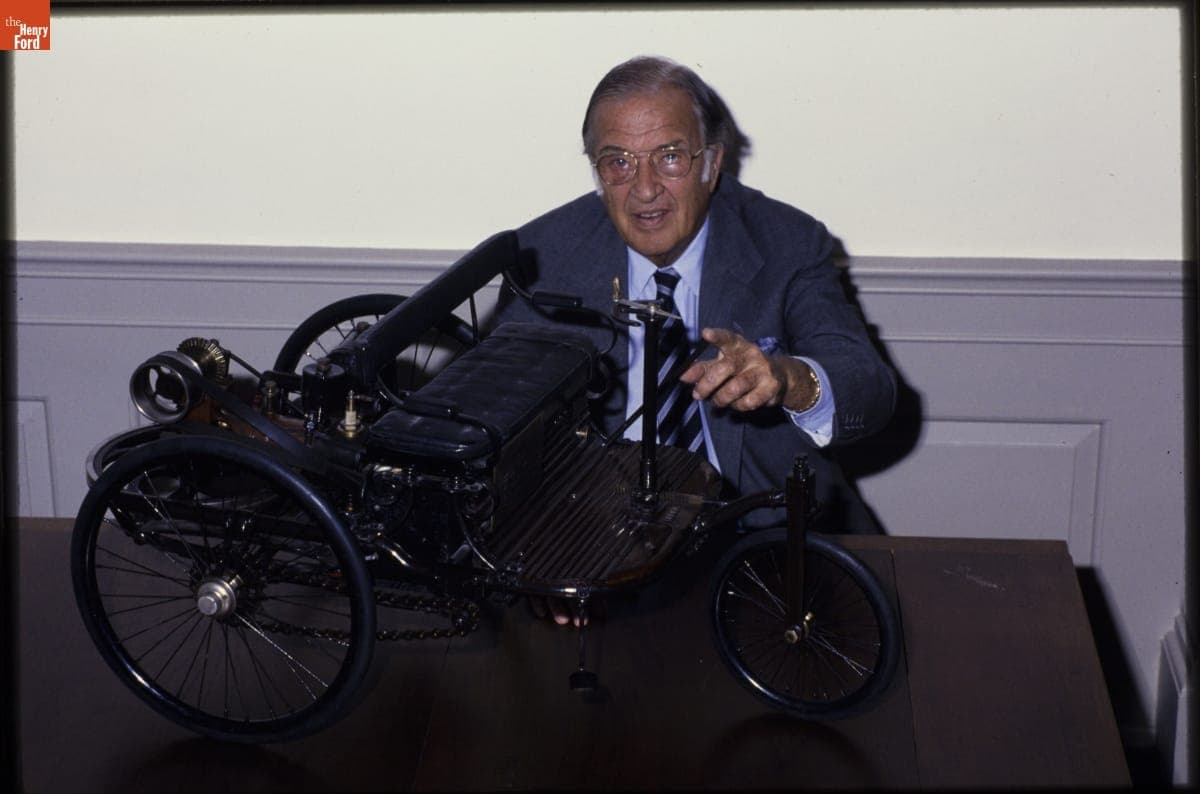 Henry Ford II with the 1885 Benz Scale Replica at Henry Ford Museum, April 1985