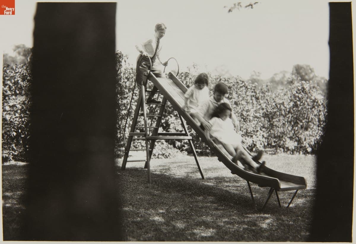 Henry Ford II, William Clay Ford, Benson Ford, and Josephine Ford on a Playground Slide, June 1929