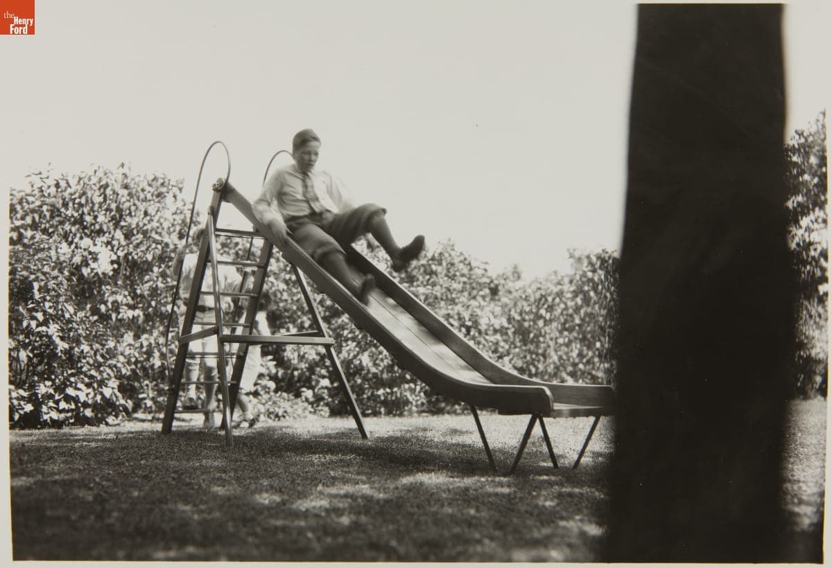 Henry Ford II on Playground Slide, June 1929