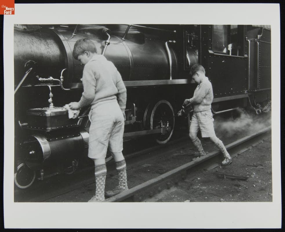 Henry Ford II and Benson Ford Cleaning Steam Engine, circa 1926