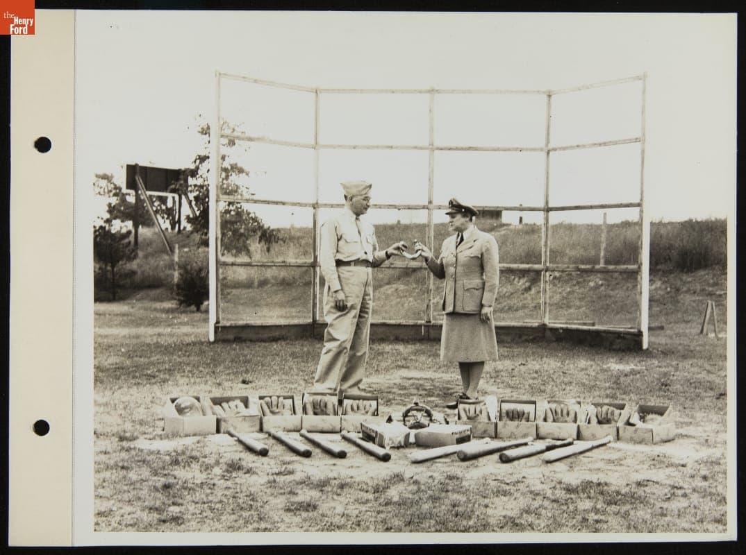 Mrs. Gitlen Presenting Baseball Equipment to Major Cohen at Willow Run Station Hospital, September 1943
