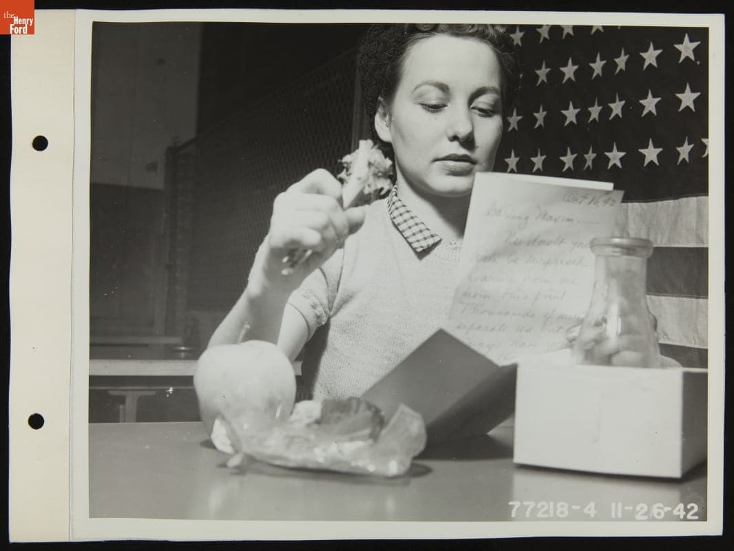 Ford Motor Company Employee Eats Thanksgiving Dinner on the Job at the Highland Park Plant, November 1942