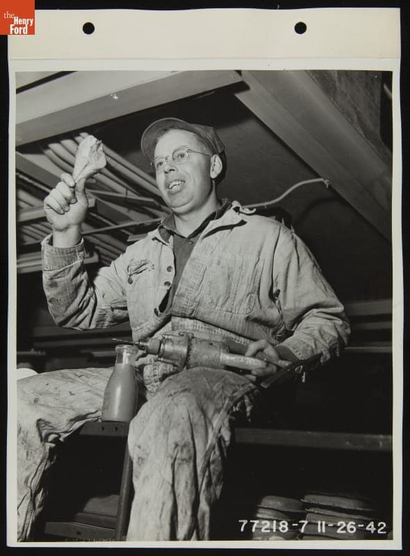 Ford Employee Harry Finn Eating Thanksgiving Dinner on the Job at the Highland Park Plant, November 1942