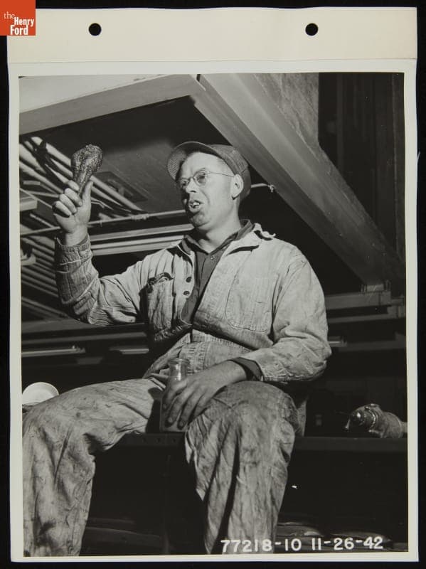 Ford Employee Harry Finn Eating Thanksgiving Dinner on the Job at the Highland Park Plant, November 1942