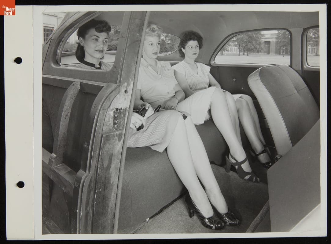 Leota Carroll and Other Women Model a Ford Car, August 1946