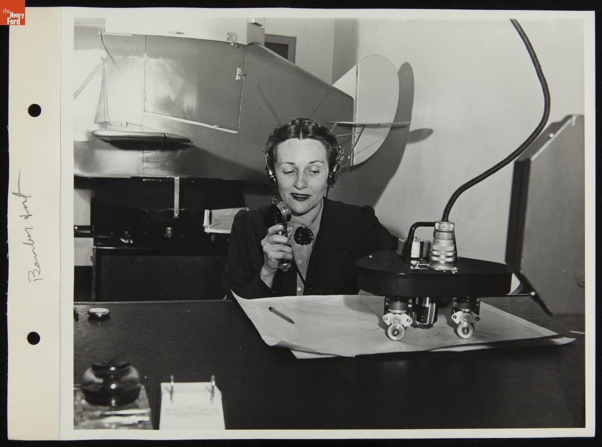 Paula Lind in Link Trainer Flight Simulator, Willow Run Bomber Plant, May 1943