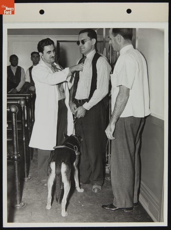 Medical Exam for Ford Employee Sylvester Rypkowski with His Service Dog, "Blackie," October 1942