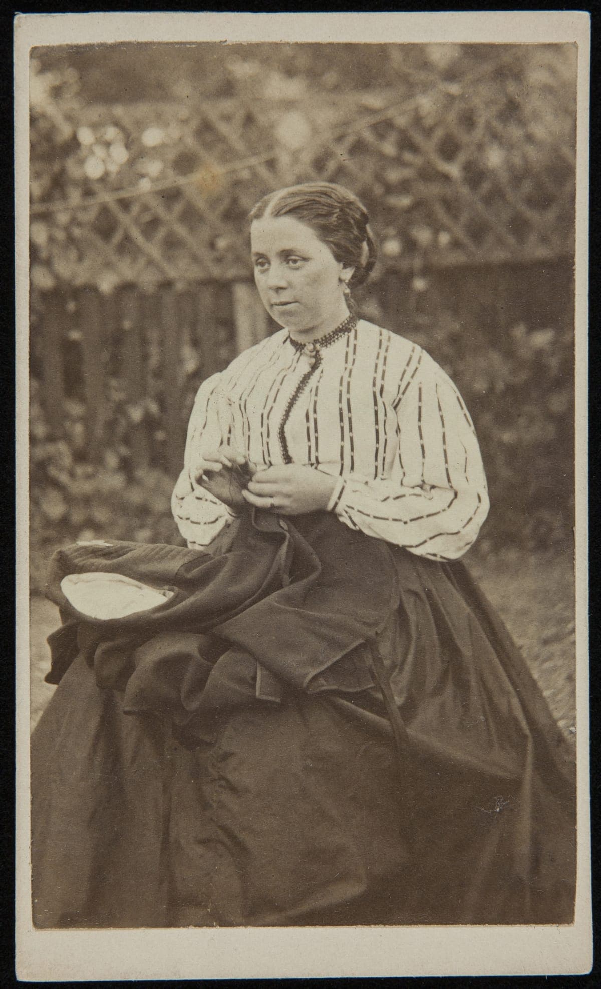 Woman Hand-Sewing, 1860-1869