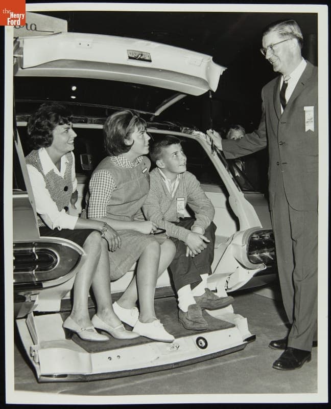 Congressman James Harvey with Ford Aurora Concept Car at New York World's Fair, 1964