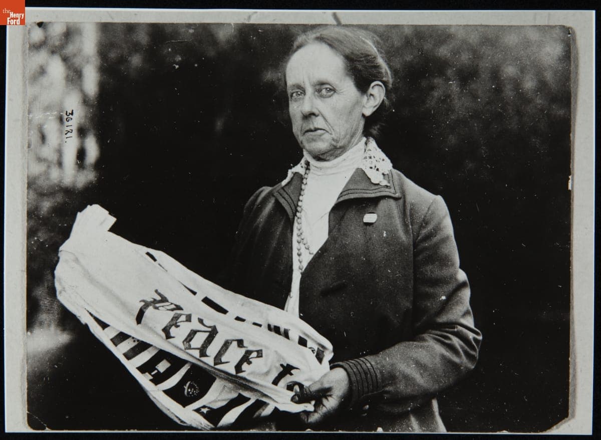Suffragist Alice Locke Park Holds a Peace Flag, 1916