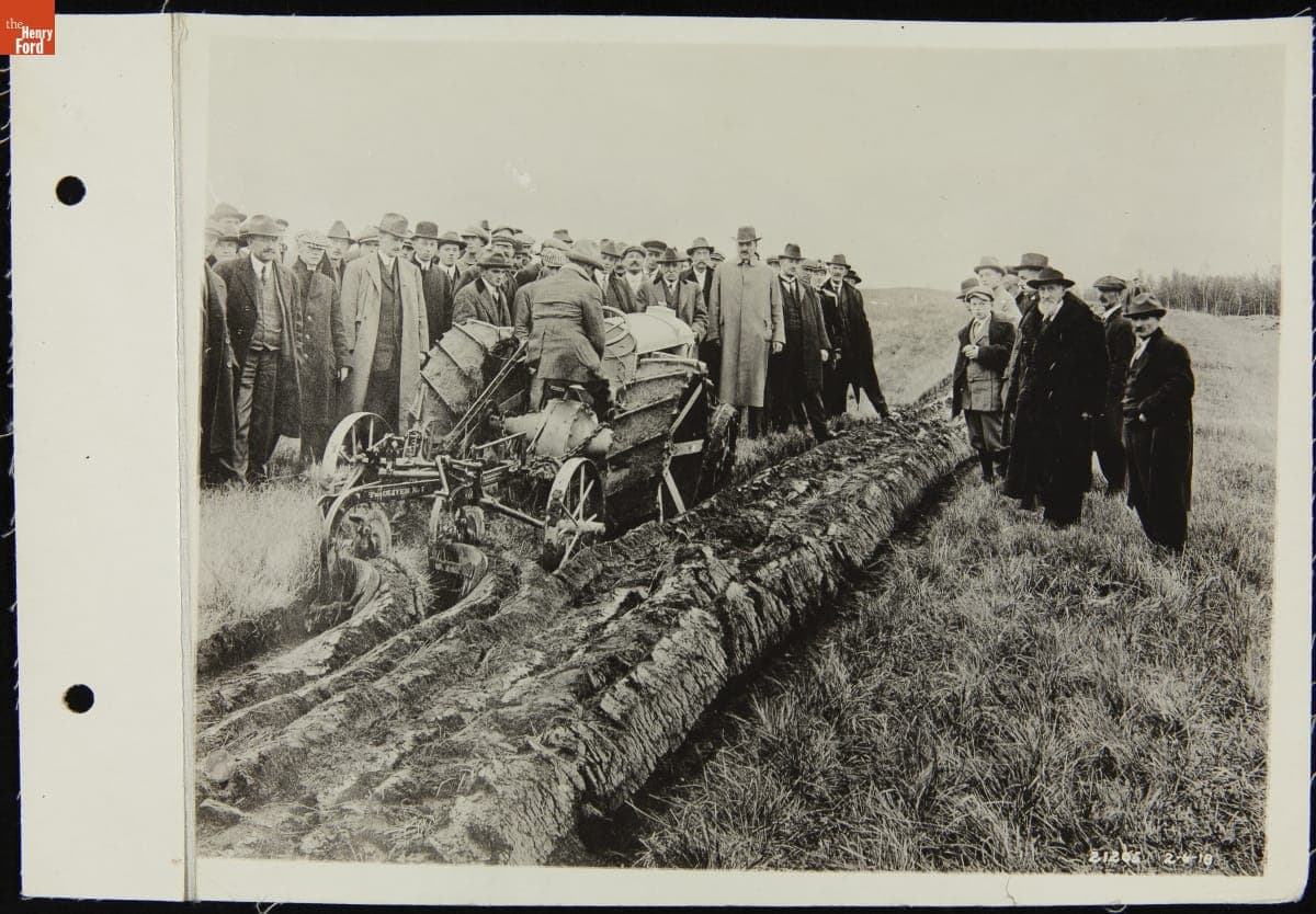 Spectators Watch a Fordson Tractor Demonstration, Plowing a Field in Kansas, February 6, 1918