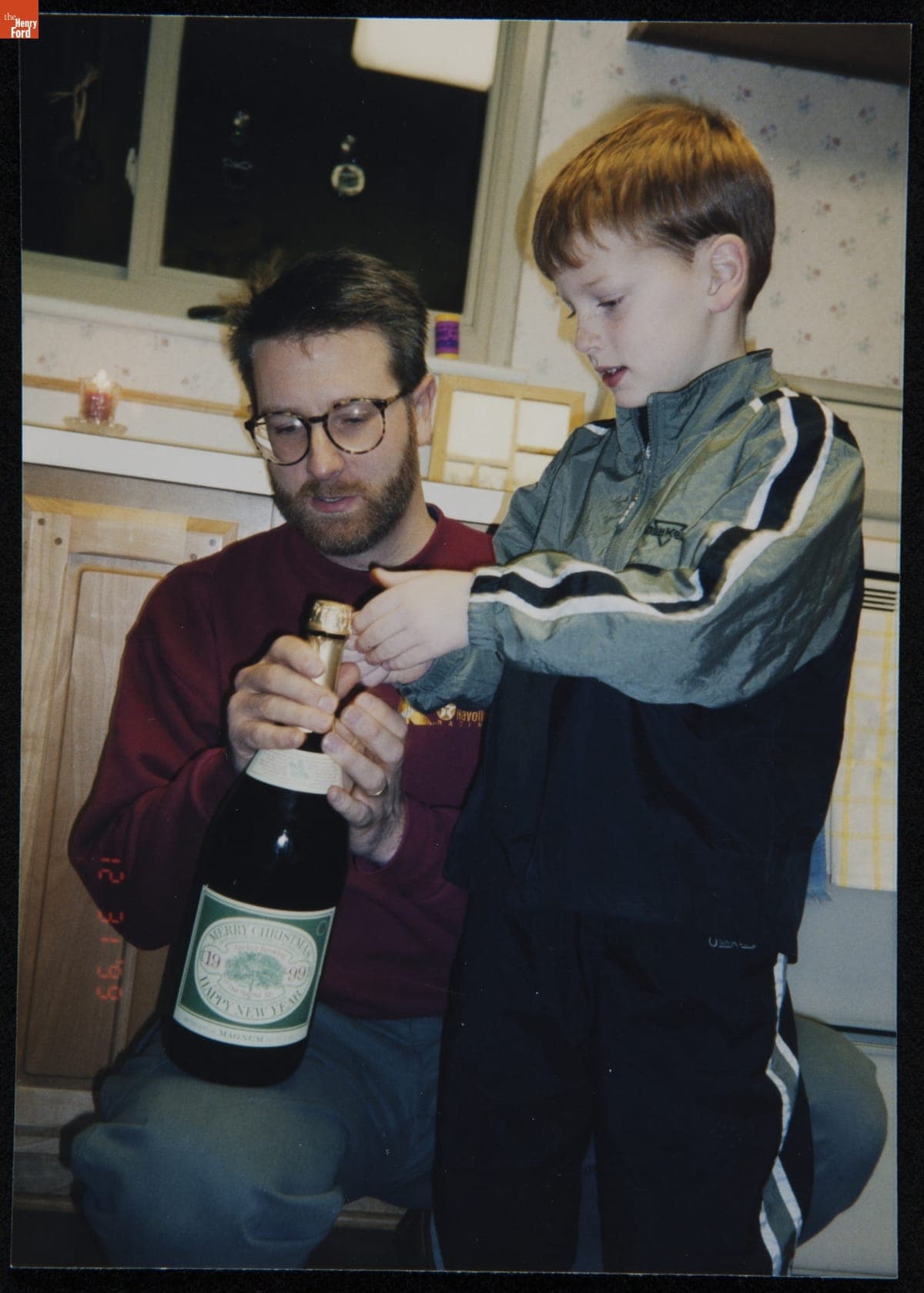 Opening a Bottle of Champagne at a New Year's Eve Party, December 31, 1999
