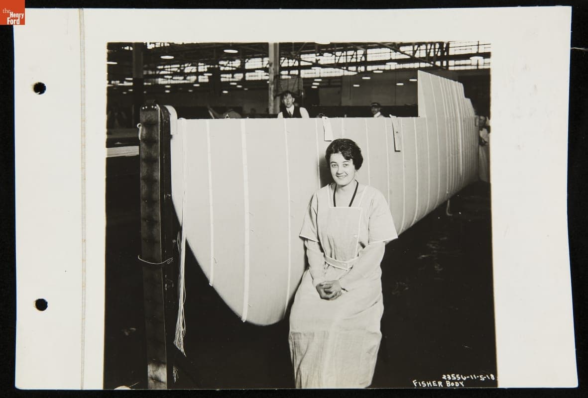 Worker Sitting Beside Airplane Wing at the Fisher Body Plant, November 4, 1918