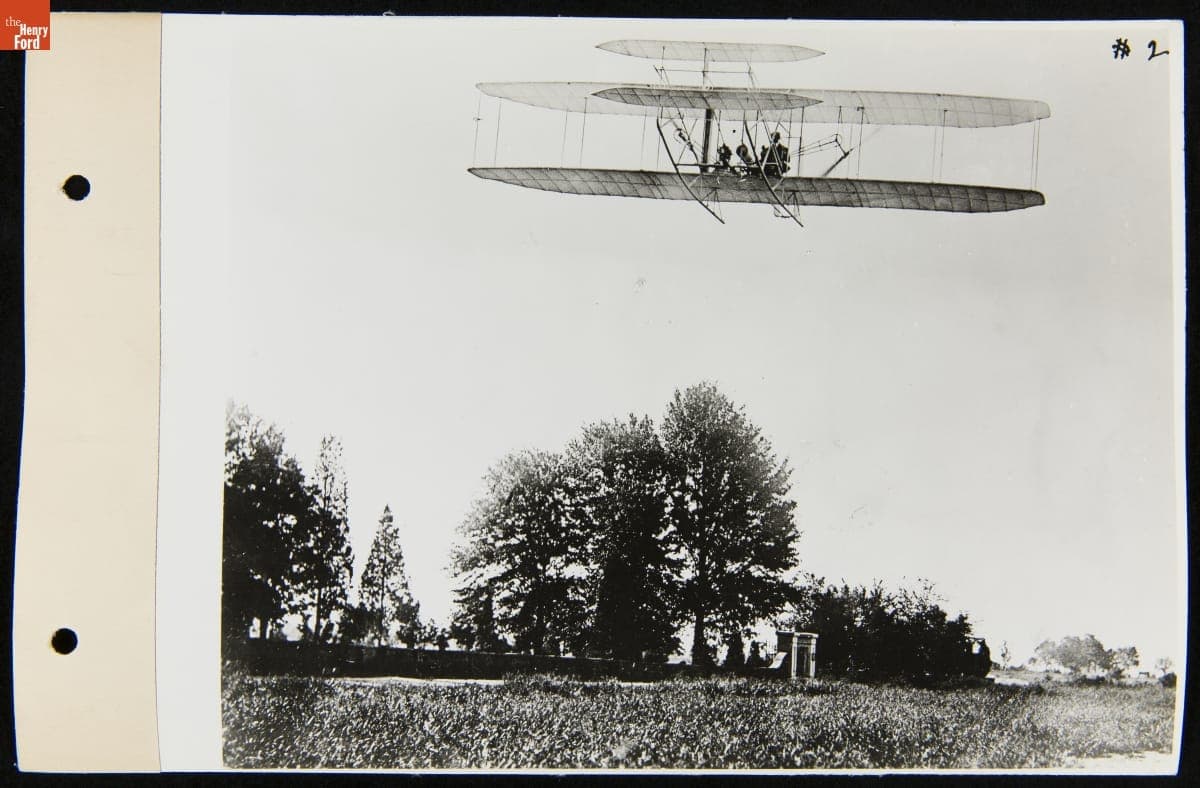 Orville Wright Piloting the Wright Model A Flyer over Arlington Cemetery Gate and Wall, 1908