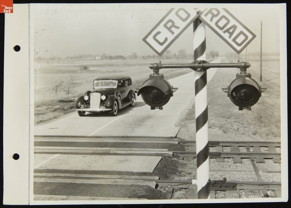 Car Stopped by Signal Light at Railroad Crossing, October 1935