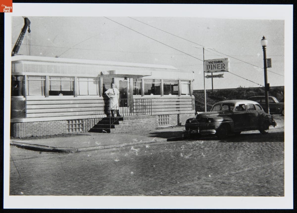 Owner George Georgenes outside the Victoria Diner in Boston, Massachusetts, 1949