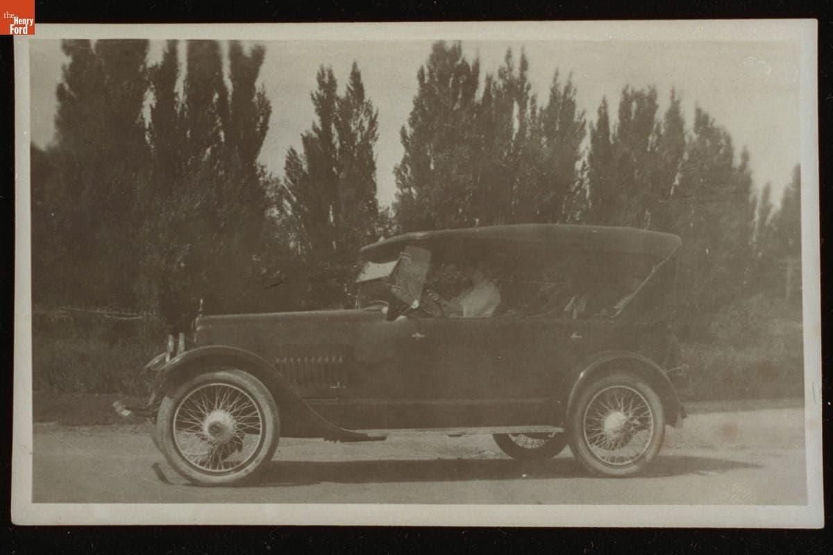 Woman Driving a Touring Automobile, circa 1920