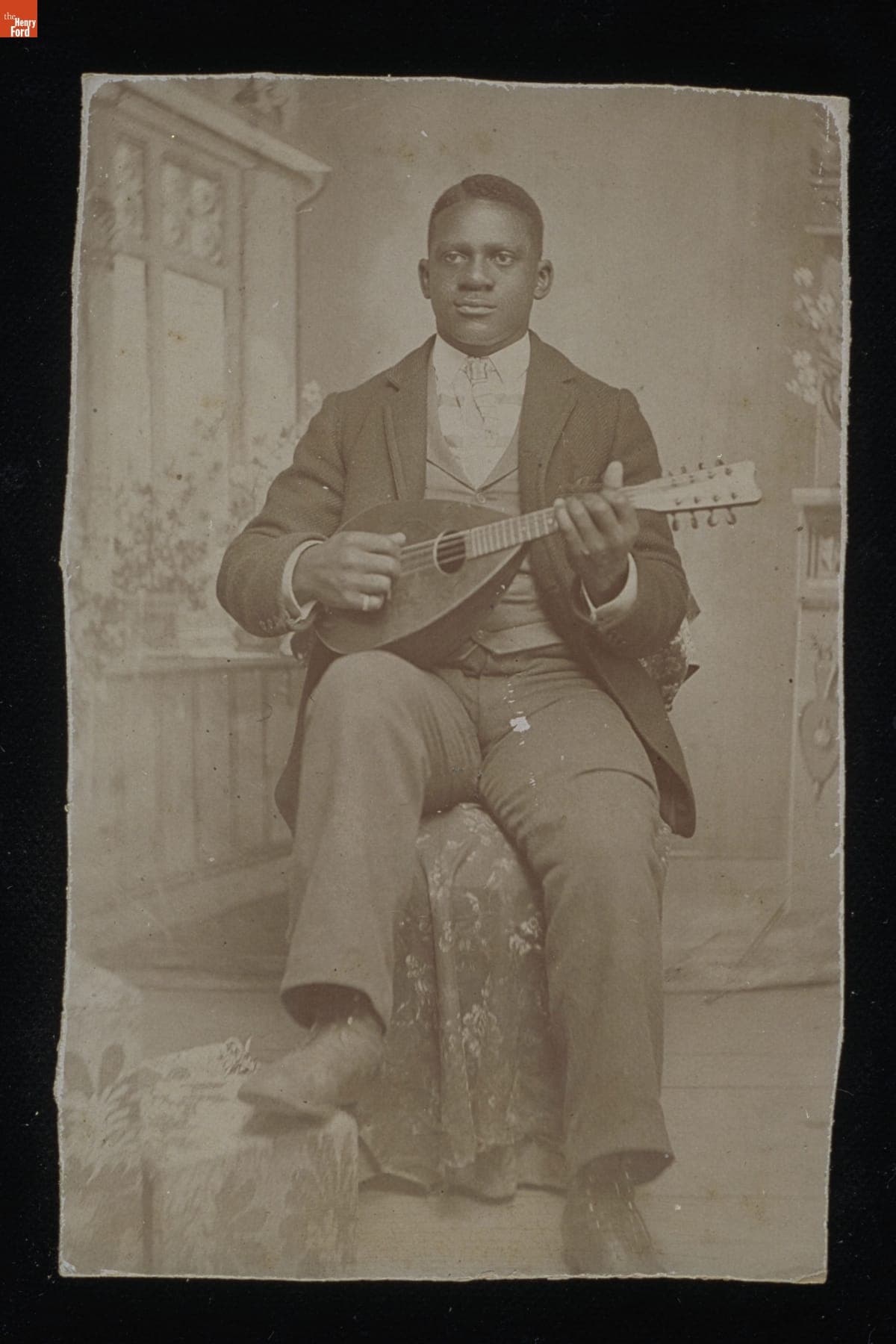 Man Holding a Mandolin, circa 1895