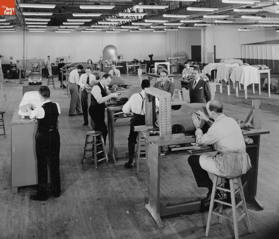 Virgil M. Exner and Raymond Loewy with Clay Modelers at Work, Studebaker Corporation, 1946
