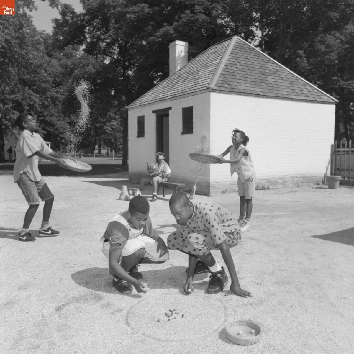 Children outside Hermitage Slave Quarters in Greenfield Village, circa 1990